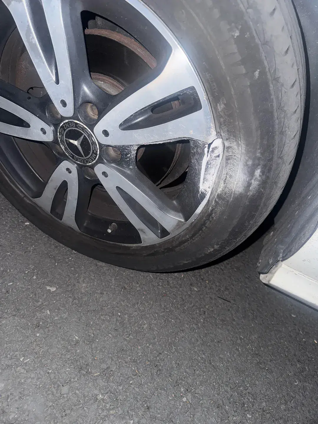 Kerbed and corroded alloy wheel brought into the Larkhall workshop for repair